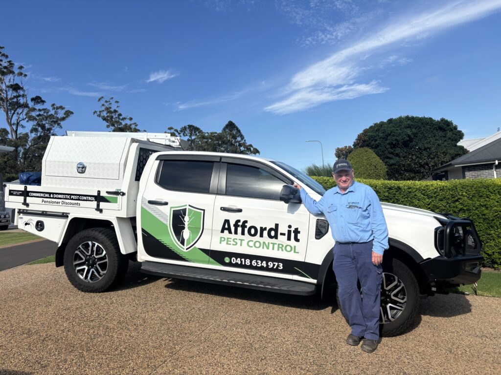 Afford-It Pest Control service vehicle parked outside residential property in Toowoomba
